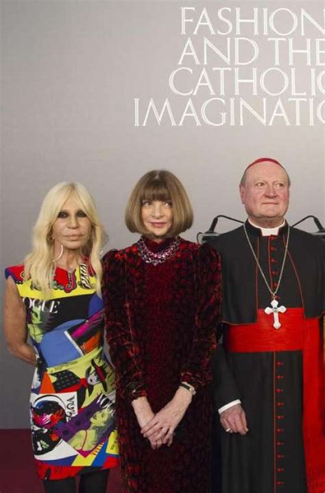 foto del card ravasi con donatella versace|From left: .